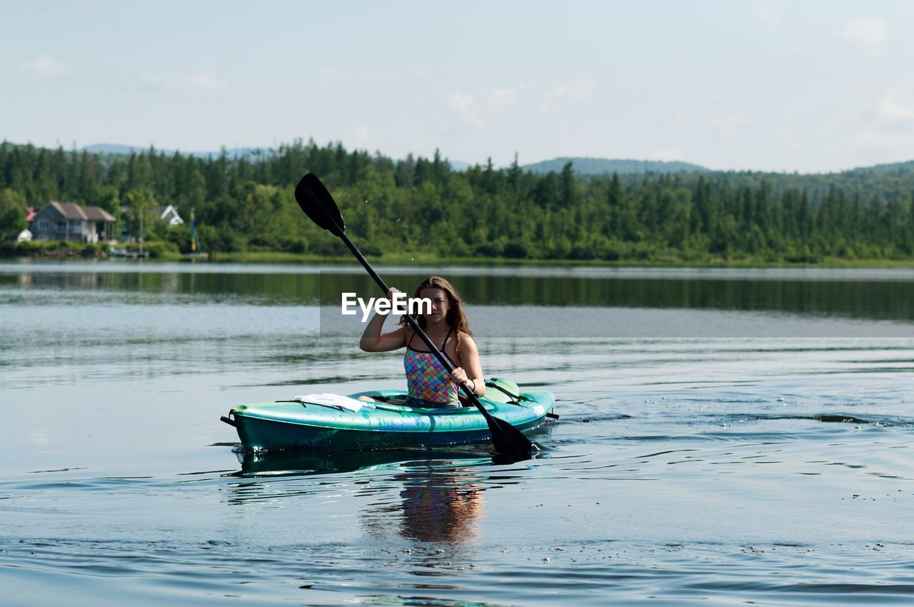 Man in boat on lake