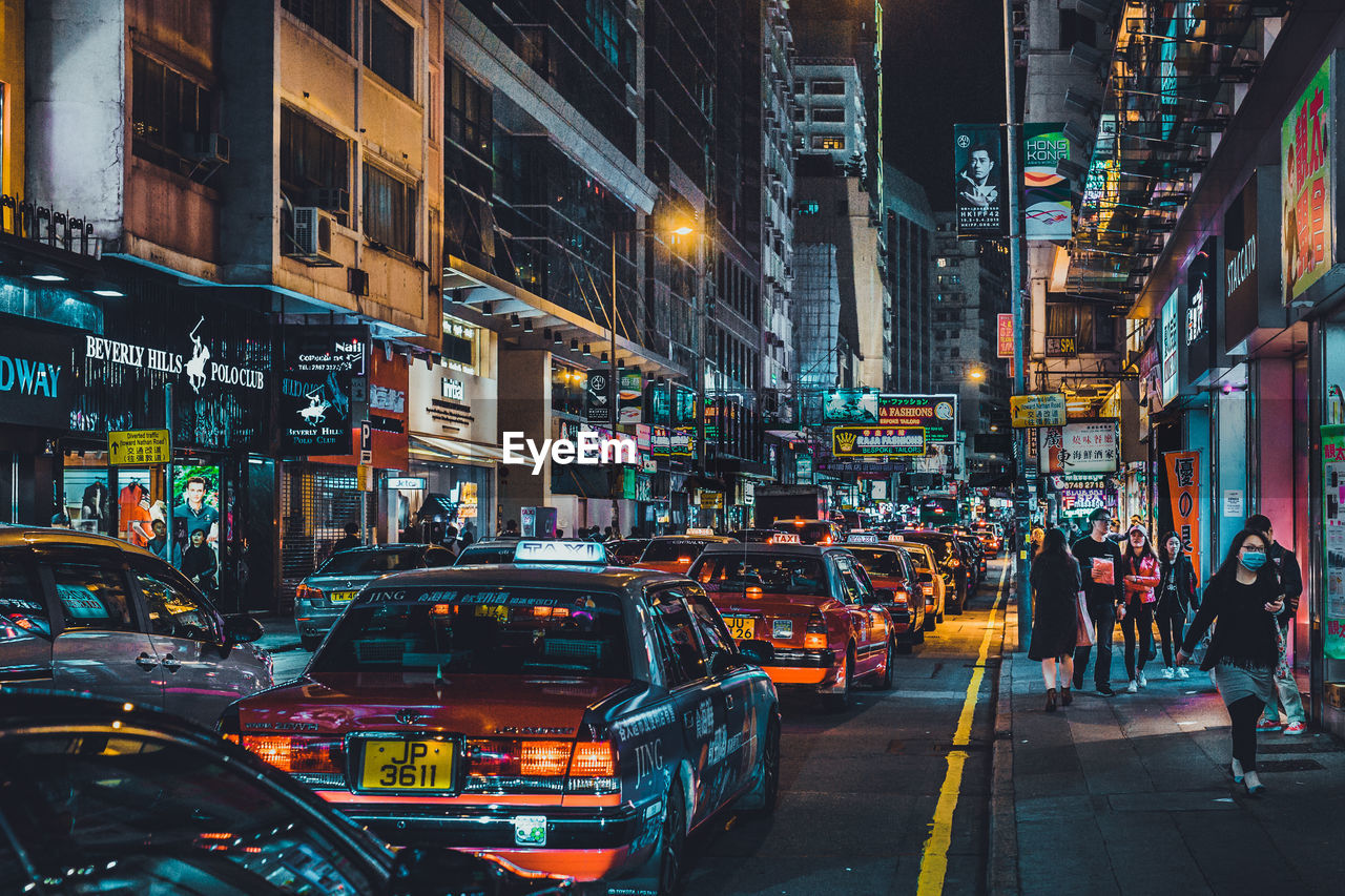 Traffic on city street at night