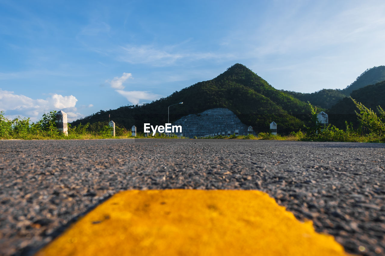 Surface level of road against sky