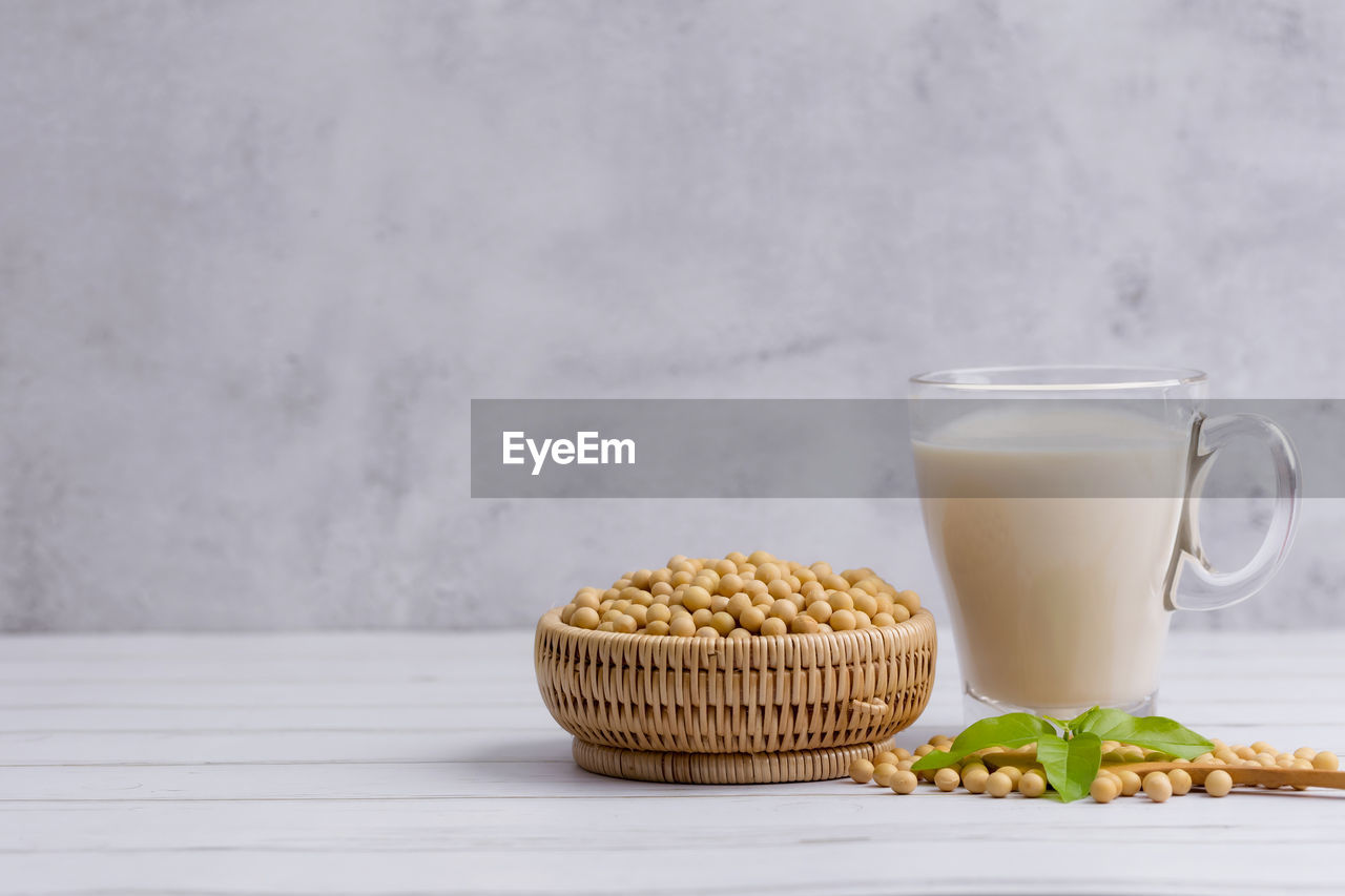 CLOSE-UP OF BREAKFAST ON TABLE AGAINST WHITE BACKGROUND