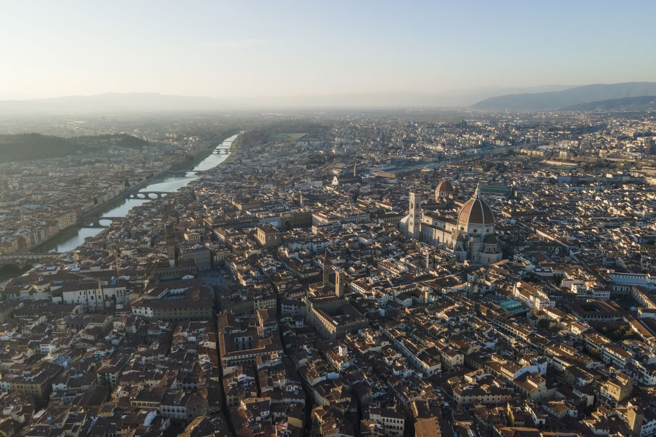 Aerial view of florence along the arno river and the old town from above, tuscany, italy,