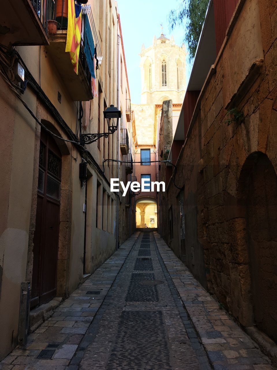 NARROW STREET BETWEEN BUILDINGS IN TOWN