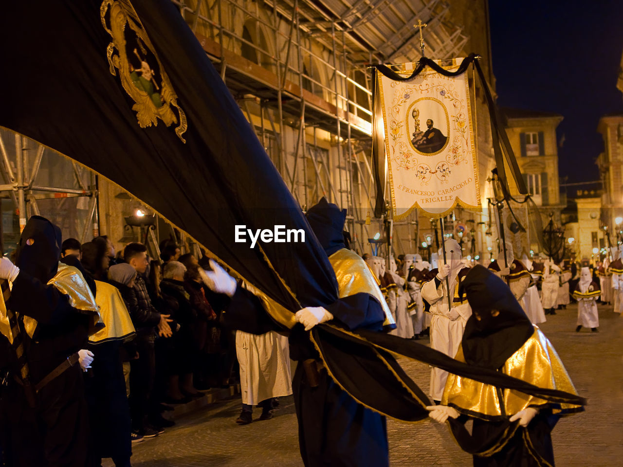 CROWD ON STREET AT NIGHT