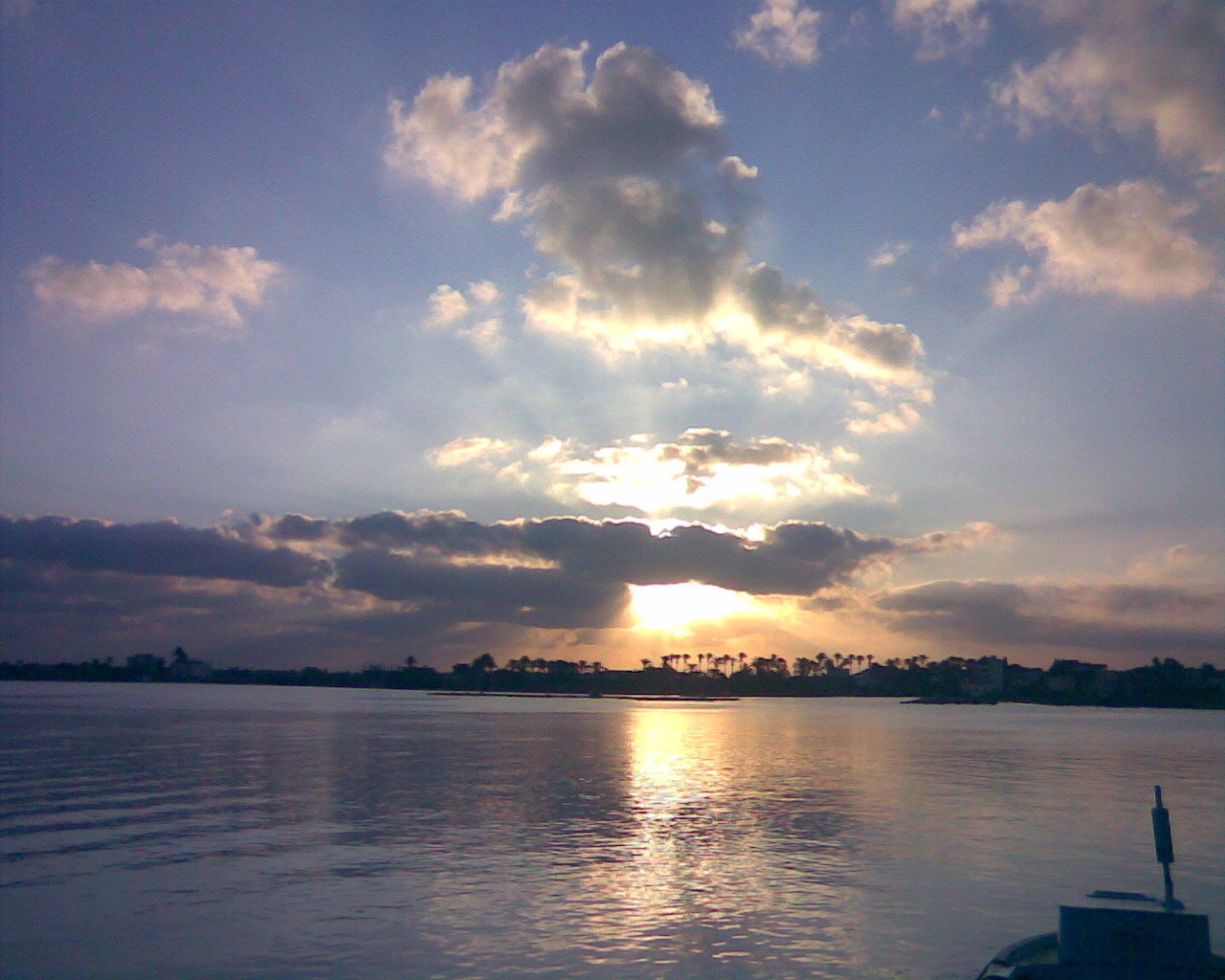 SCENIC VIEW OF SUNSET OVER WATER