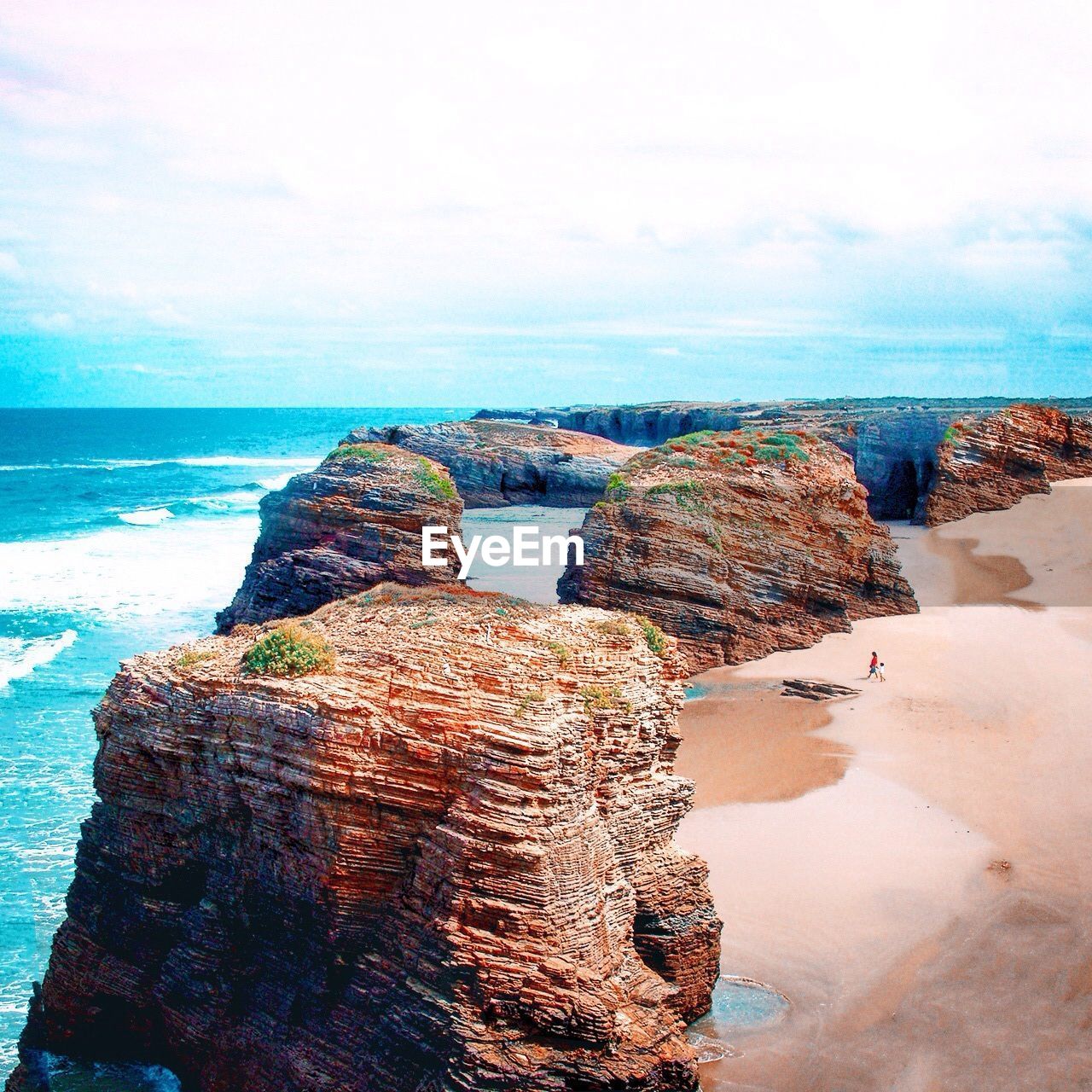 High angle view of rock formations at coast