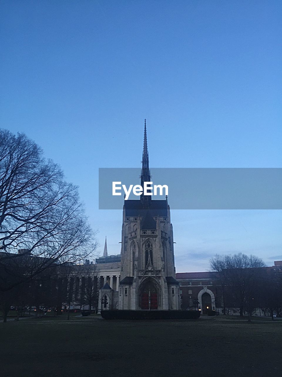 VIEW OF CHURCH AGAINST BLUE SKY