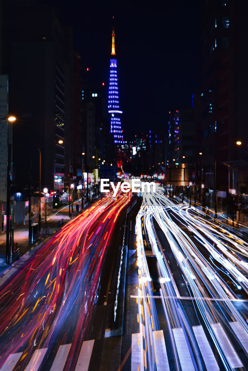 High angle view of light trails on road at night