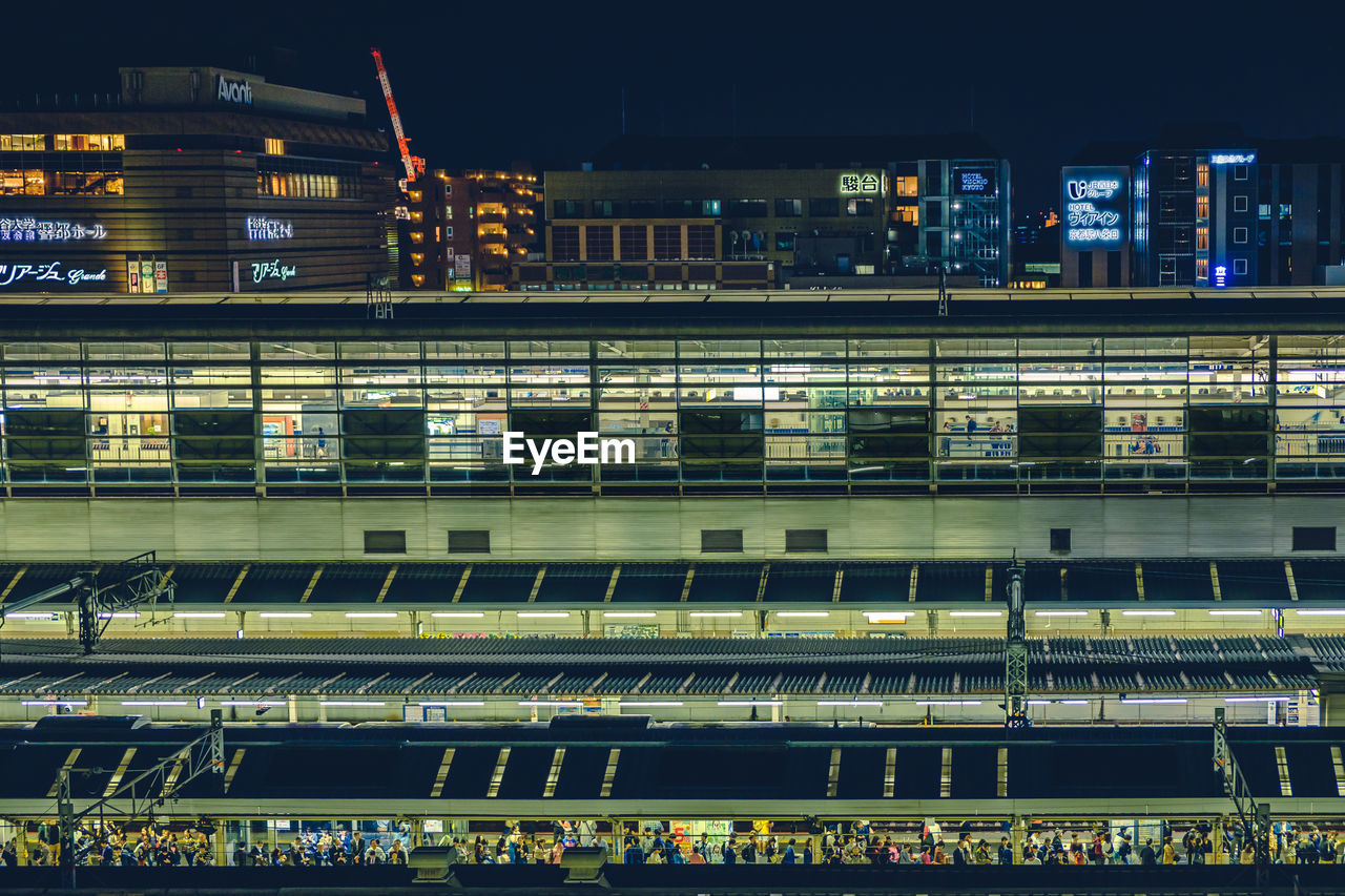 Low angle view of kyoto station platform at night