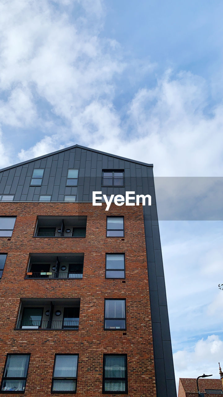 Low angle view of building against sky