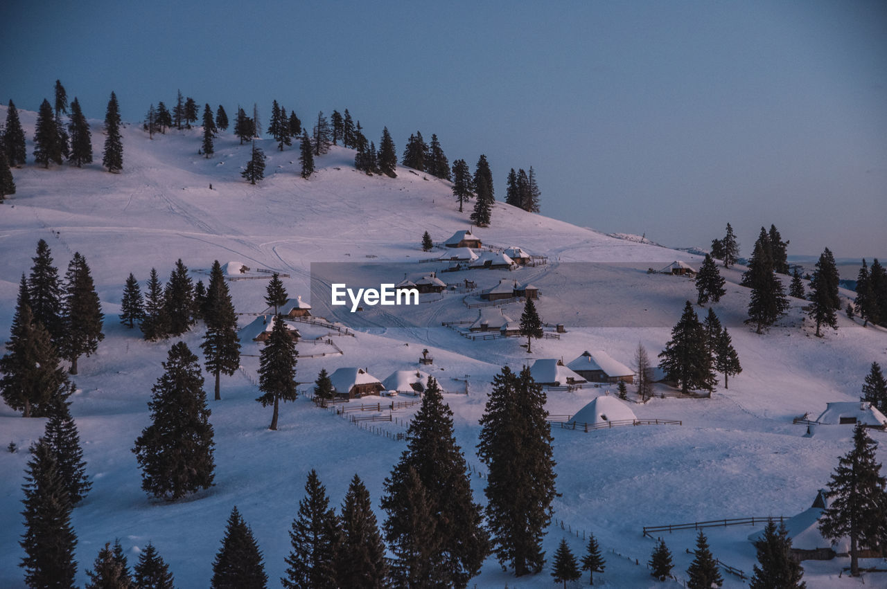 Blue hour winter landscape on velika planina