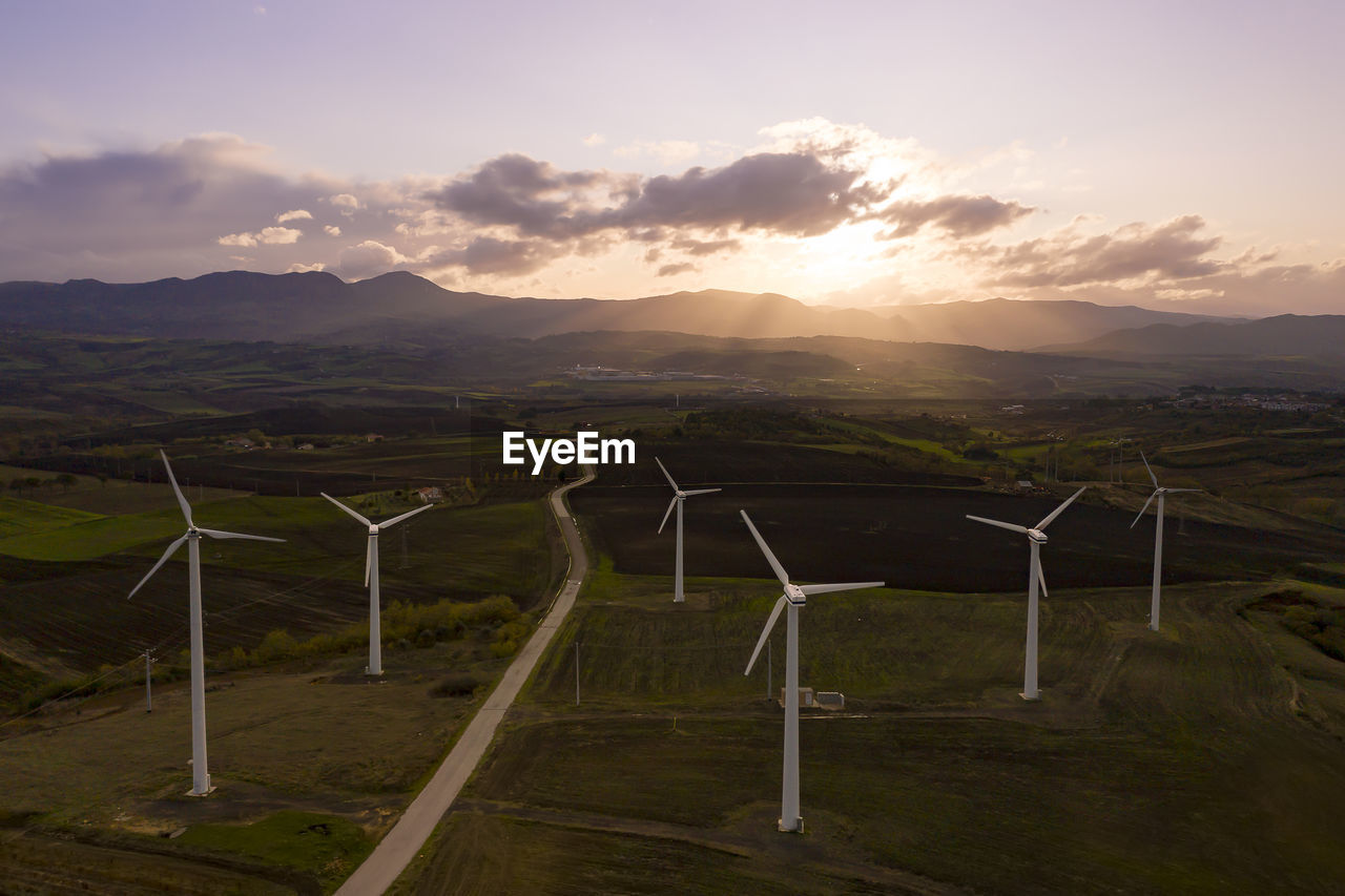 Wind turbines at the sunset 