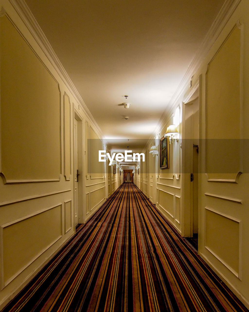 Empty hotel rooms corridor