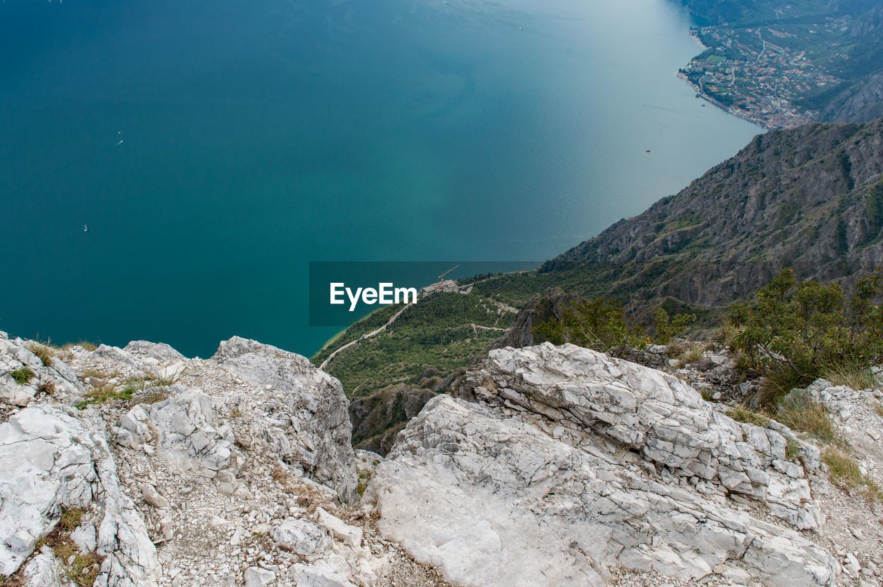 Scenic view of cliff and lake