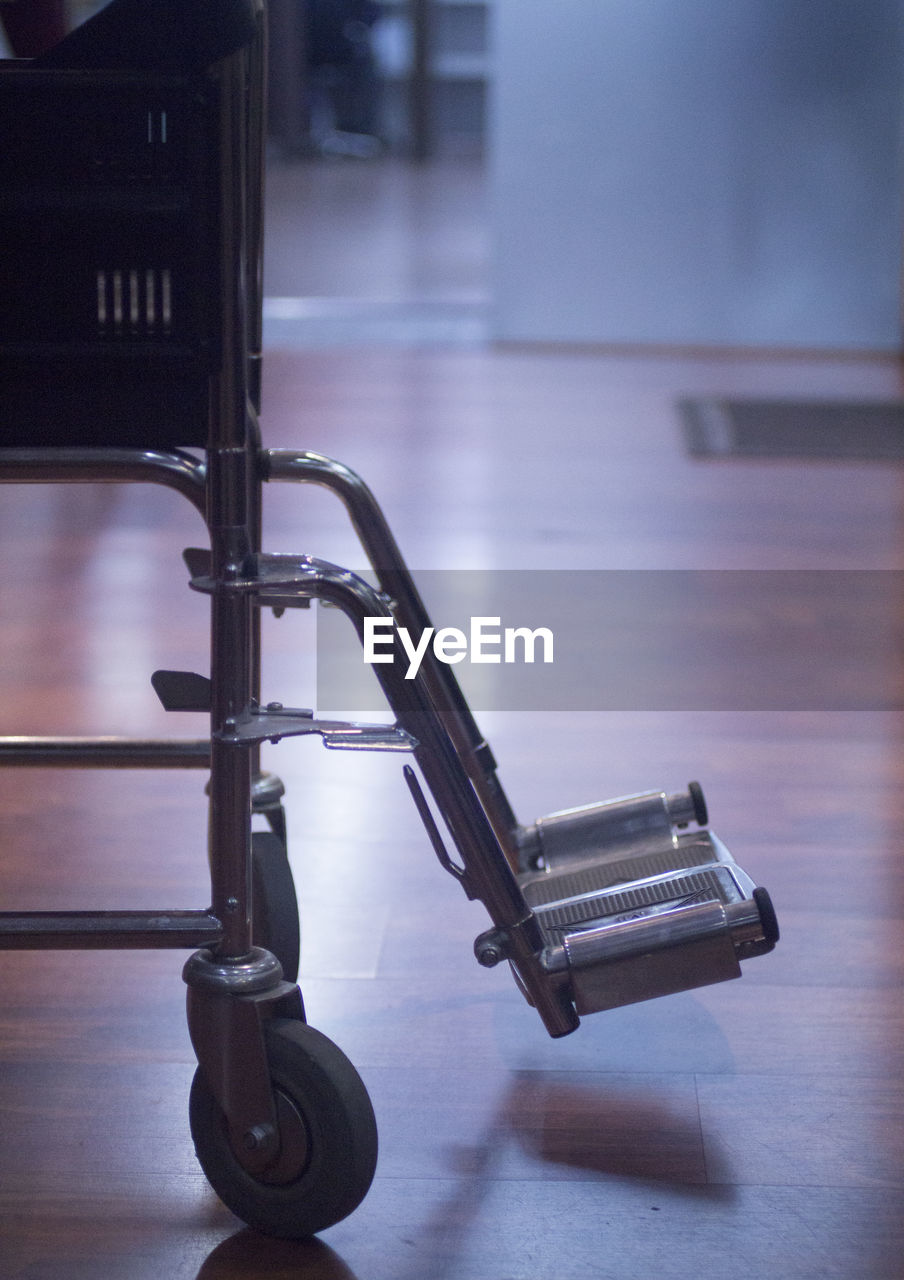 Close-up of wheelchair in hospital