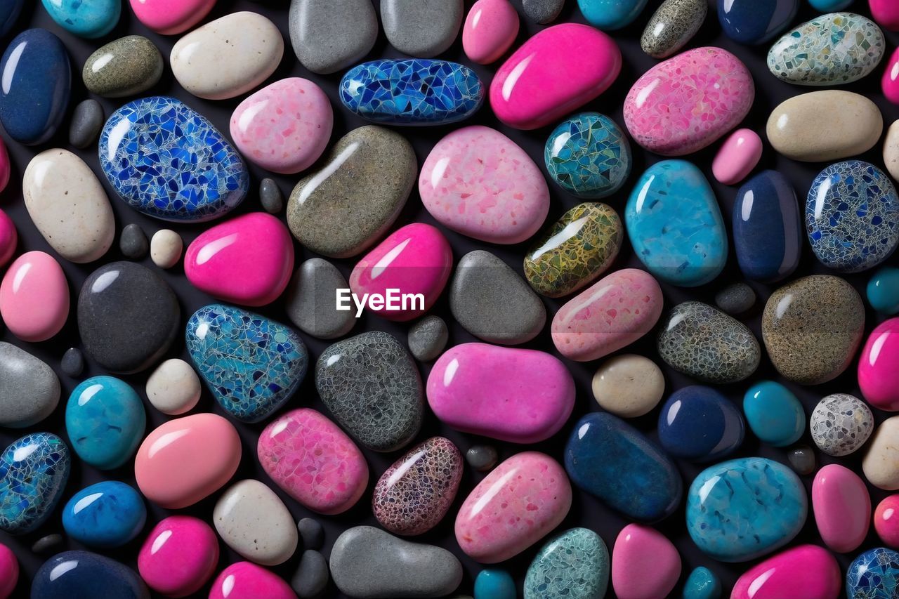 multi colored, large group of objects, variation, abundance, full frame, backgrounds, purple, blue, no people, close-up, pebble, pink, shape, petal, rock, turquoise, azure, stone, still life, green, heap, candy