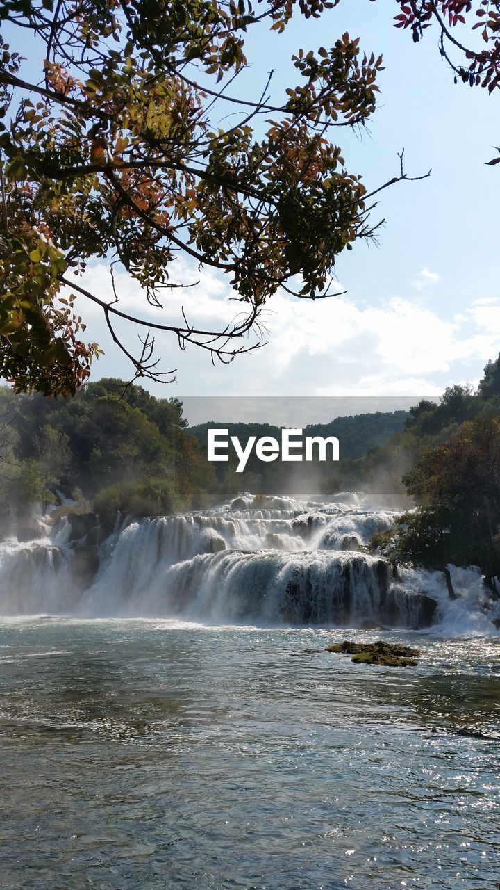 SCENIC VIEW OF WATERFALL