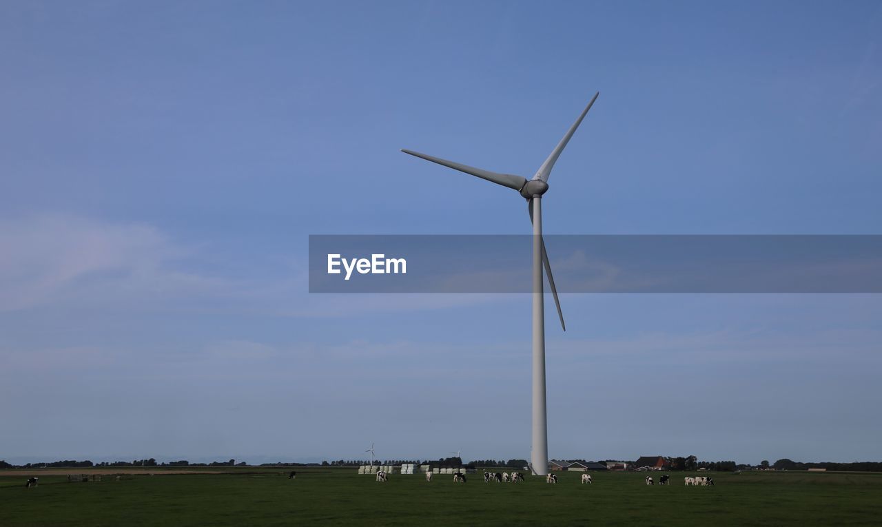 WIND TURBINES ON FIELD