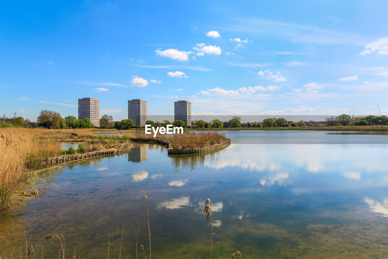 Reflection of buildings in lake