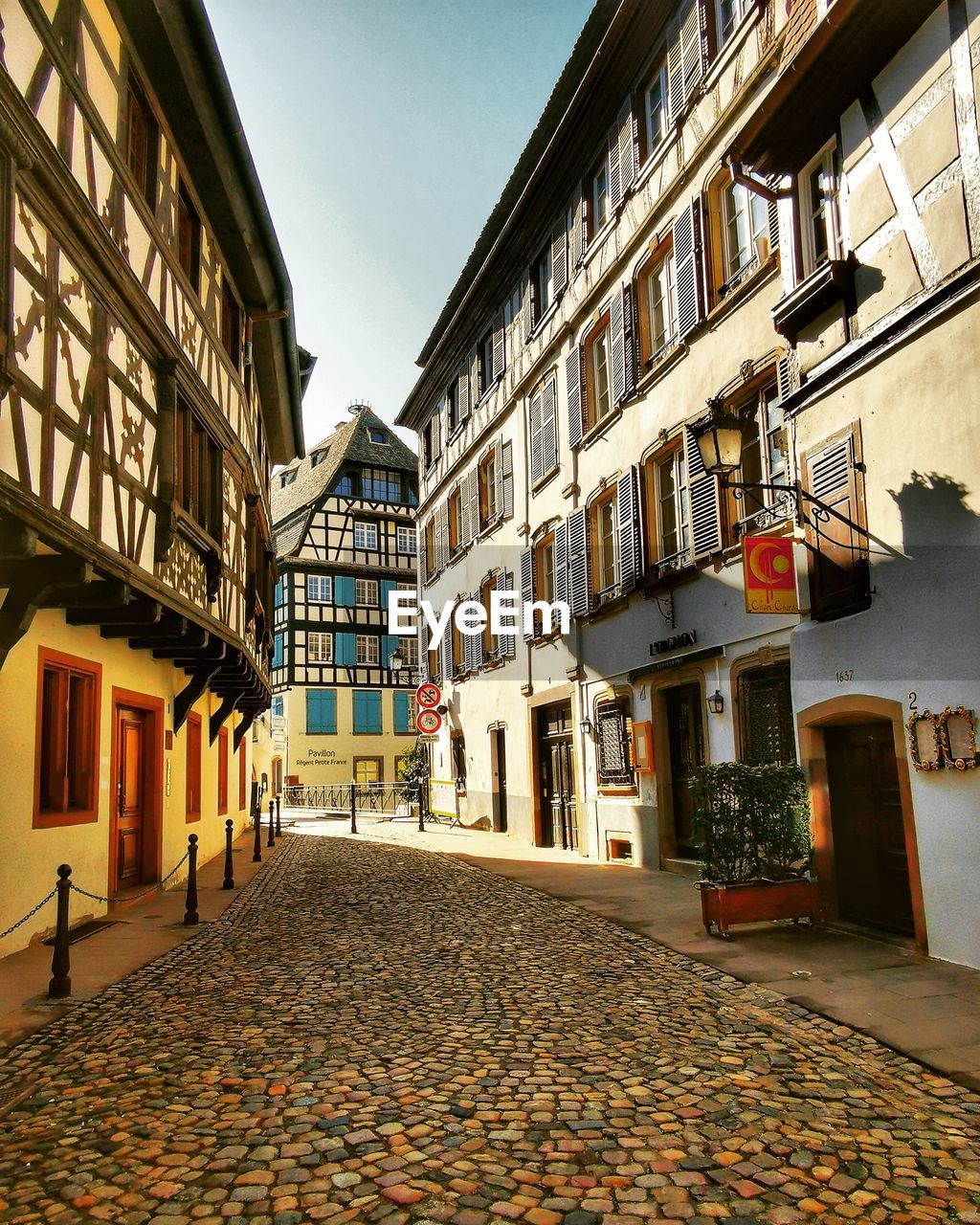 STREET AMIDST BUILDINGS IN TOWN