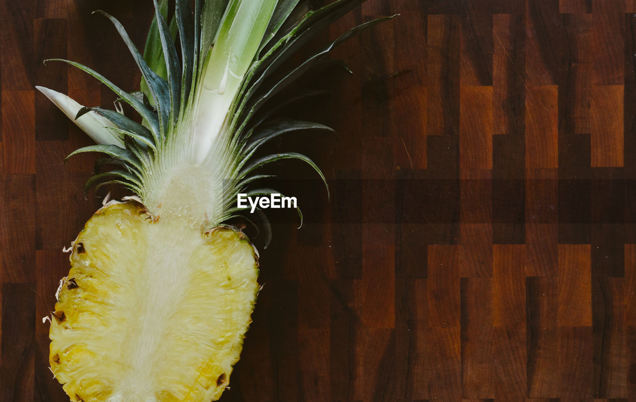 Close-up of pineapple on cutting board