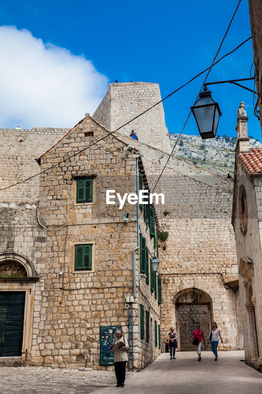 People walking at the beautiful alleys in the walled old town of dubrovnik