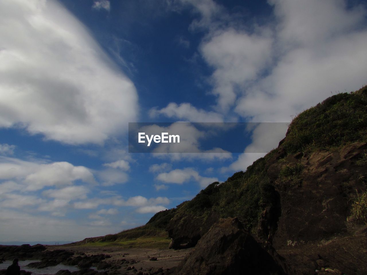 MOUNTAIN AGAINST SKY