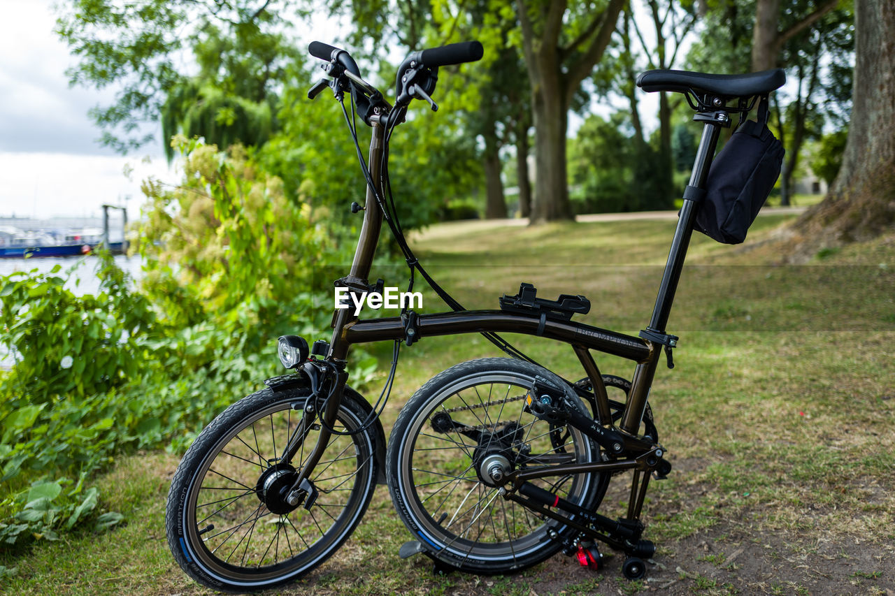 Bicycle parked on field