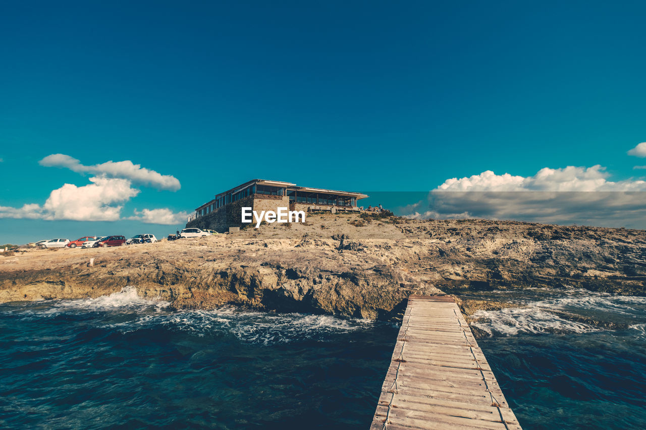 Restaurant at beach against sky at formentera island