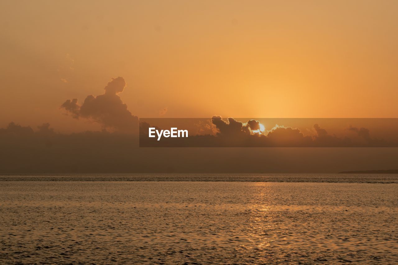 Golden sunset view with the ocean in okinawa japan