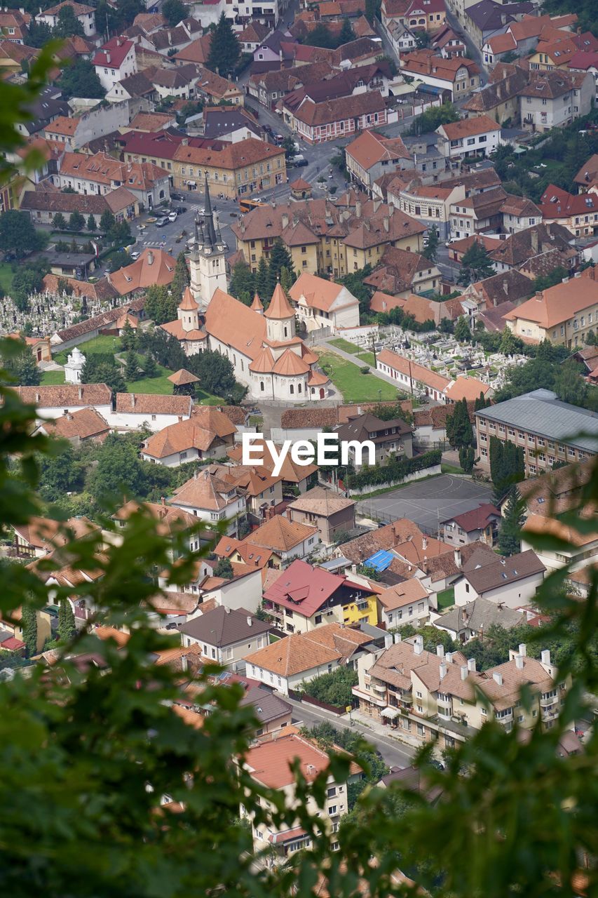 High angle view of townscape and trees in town