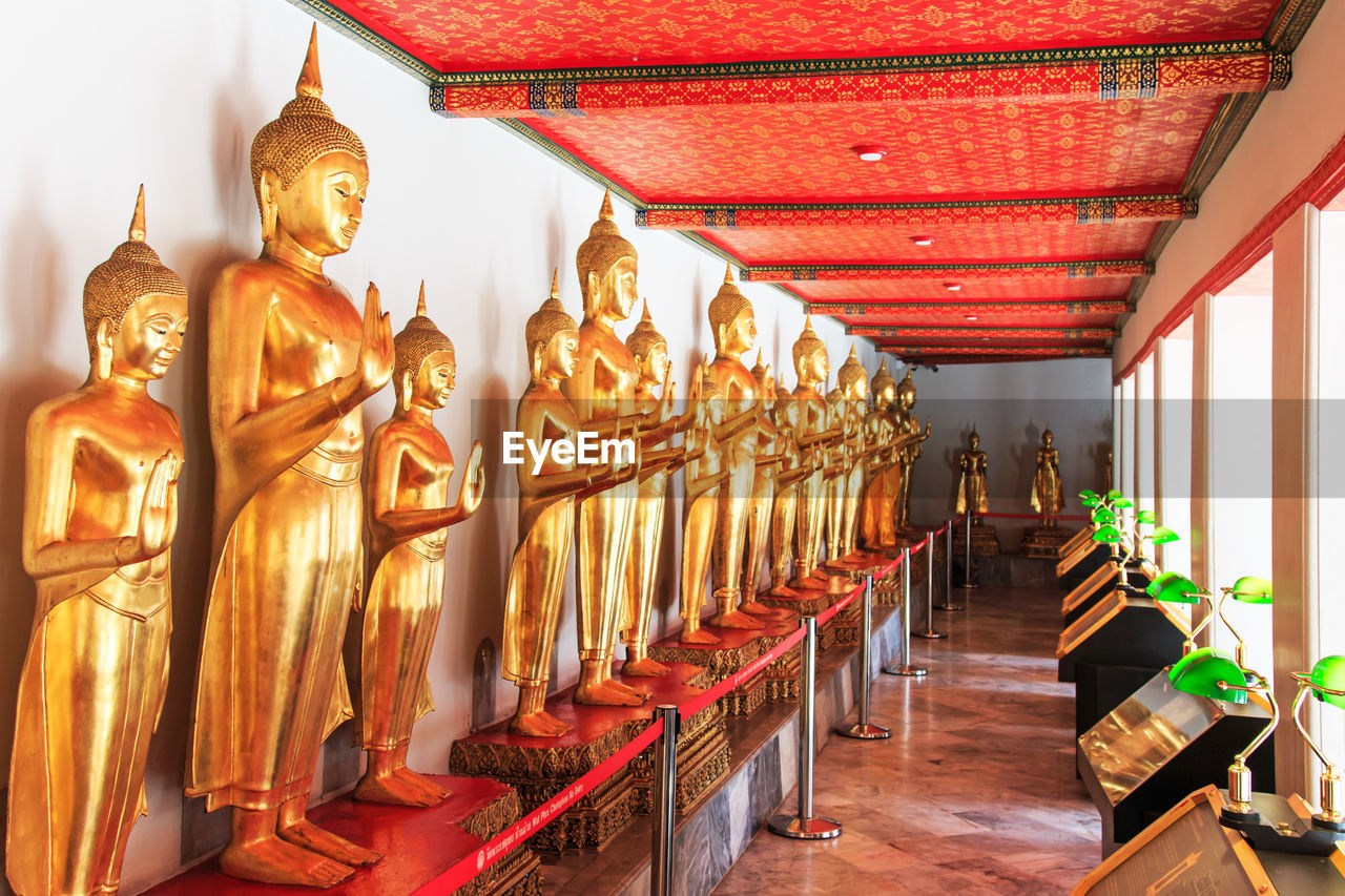 Gold buddha statues in wat pho