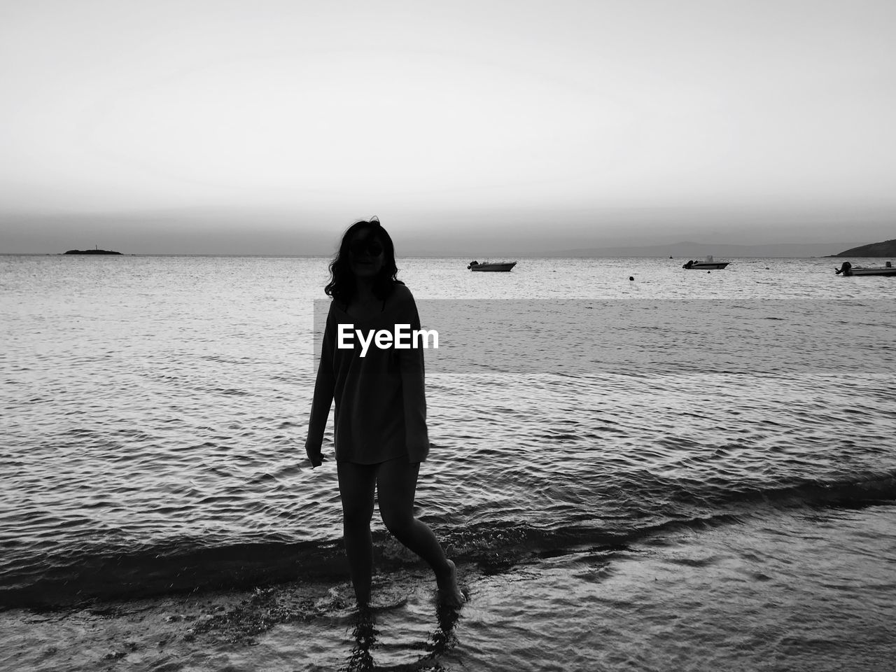 Woman standing at beach