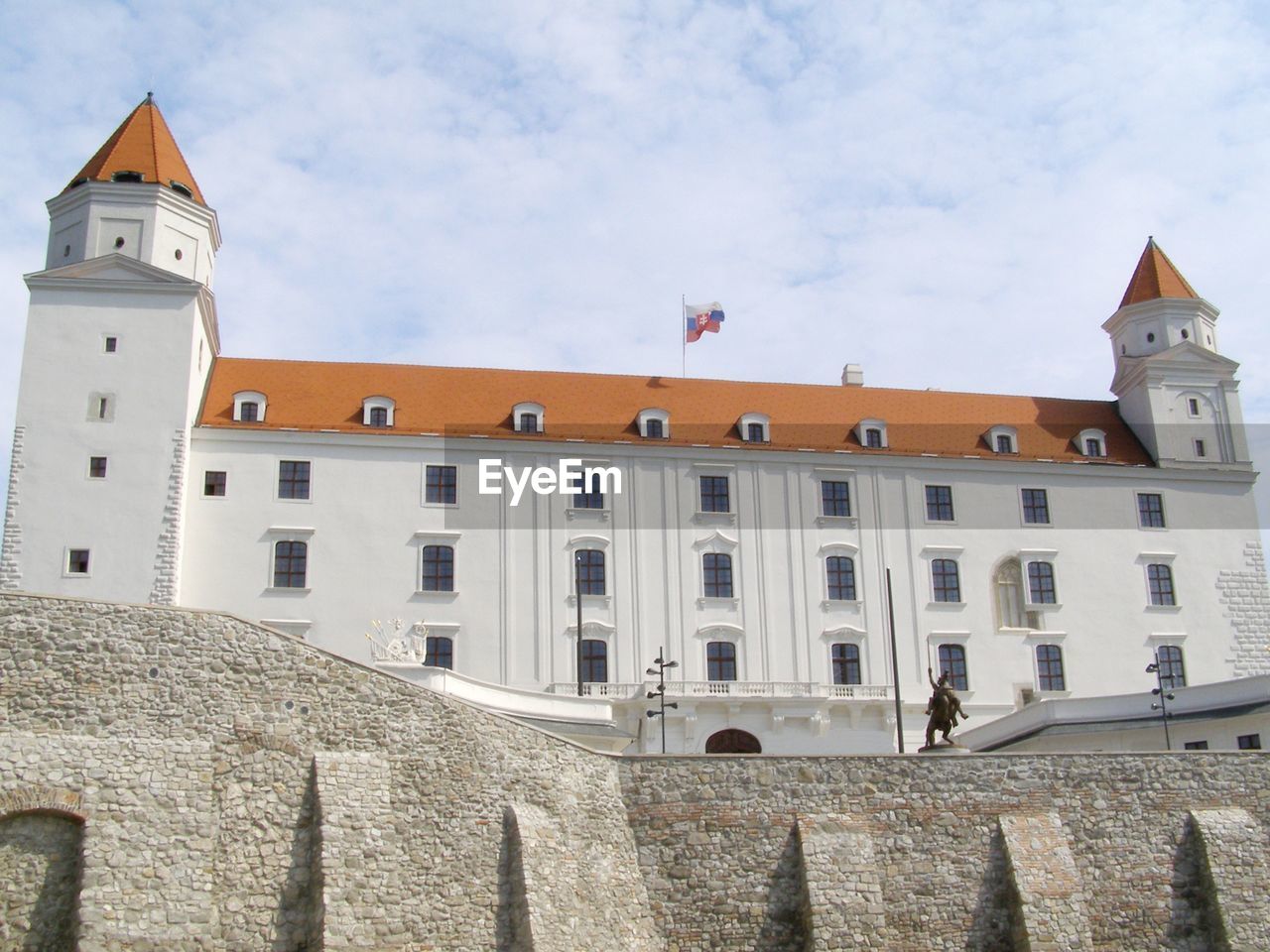 low angle view of historic building against cloudy sky