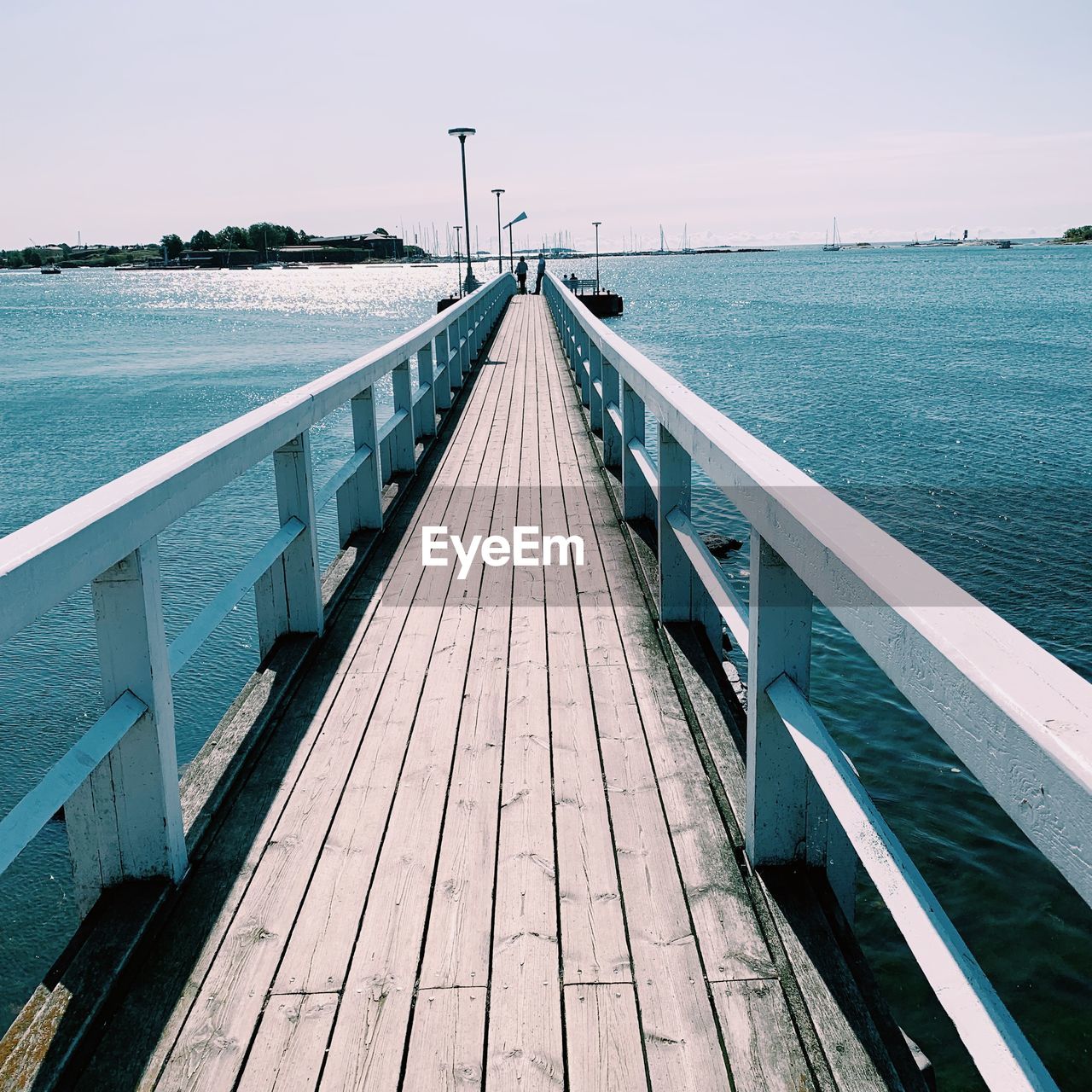 View of pier on sea against sky