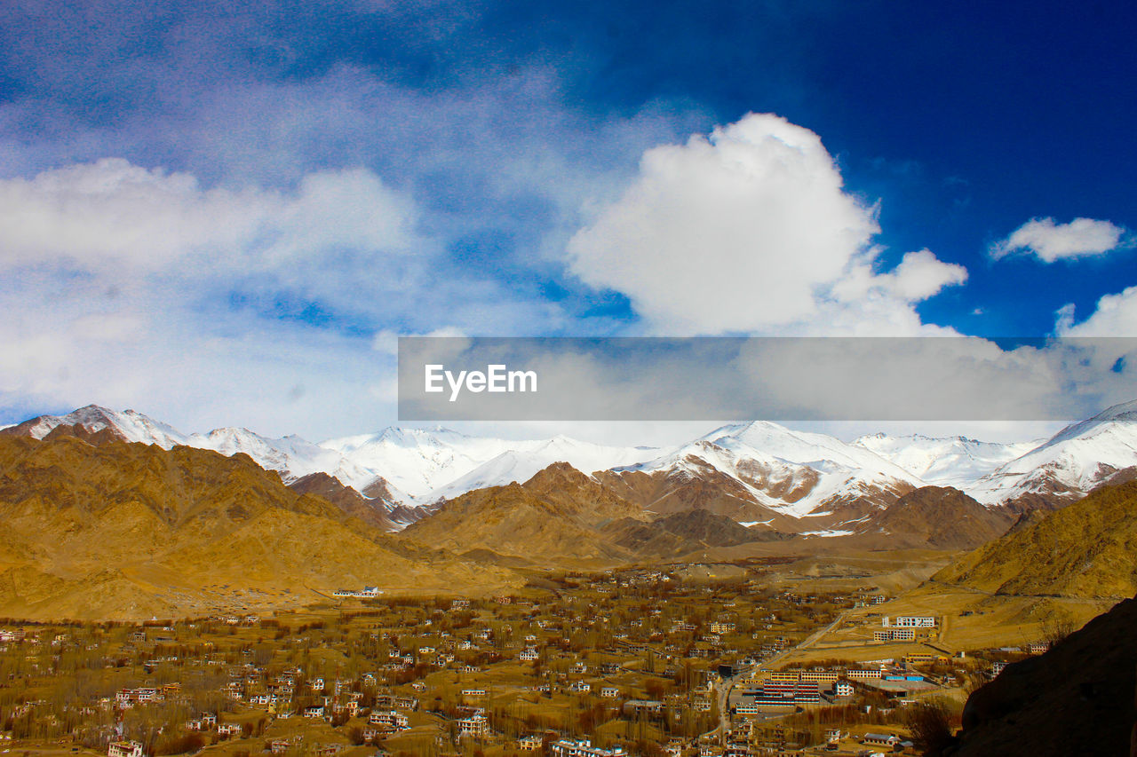 Scenic view of snowcapped mountains against sky