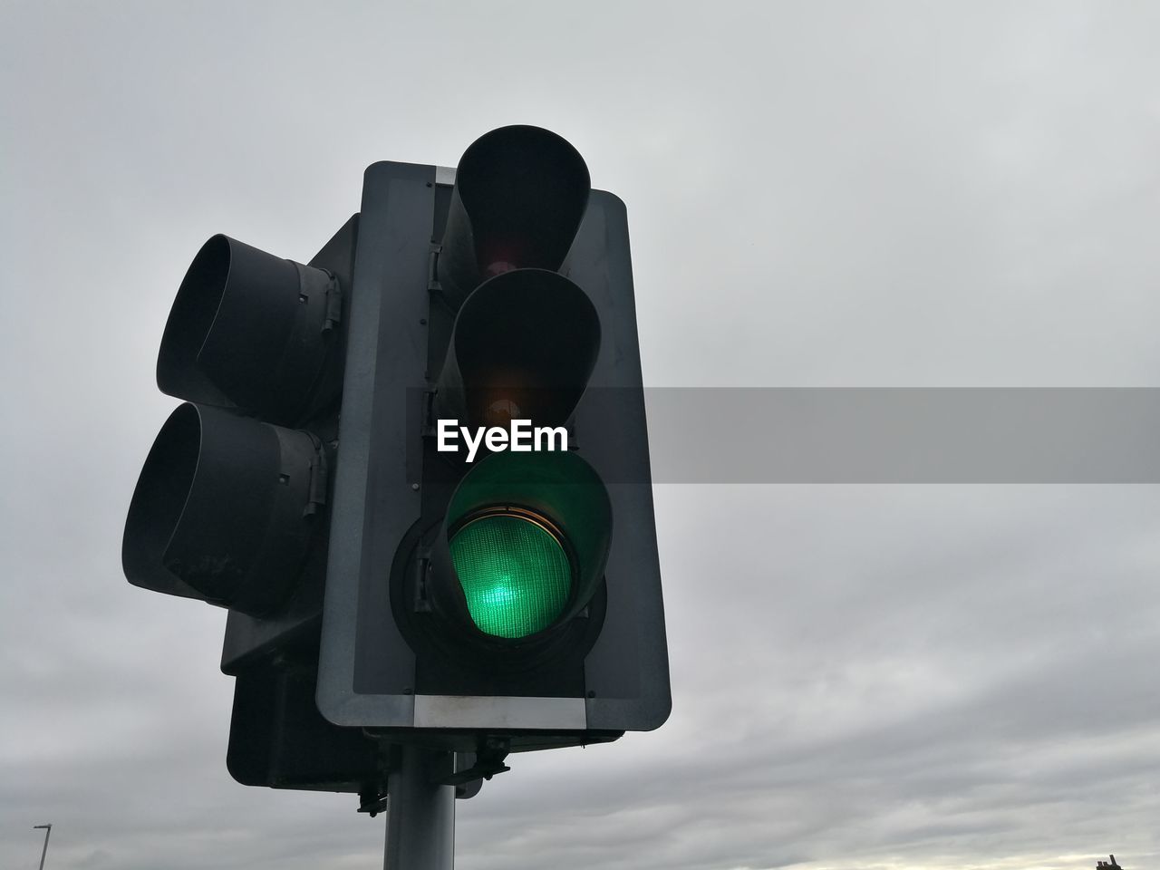 Close up of traffic light set to green