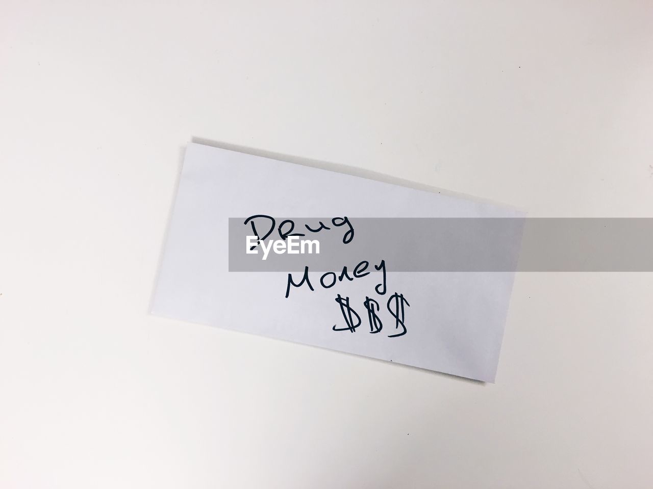 Close-up of paper with text on table