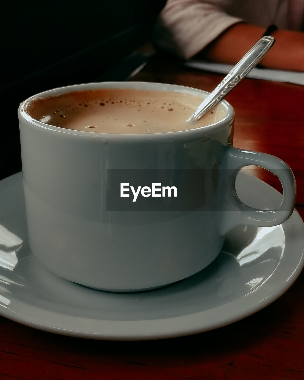 Close-up of coffee cup on table