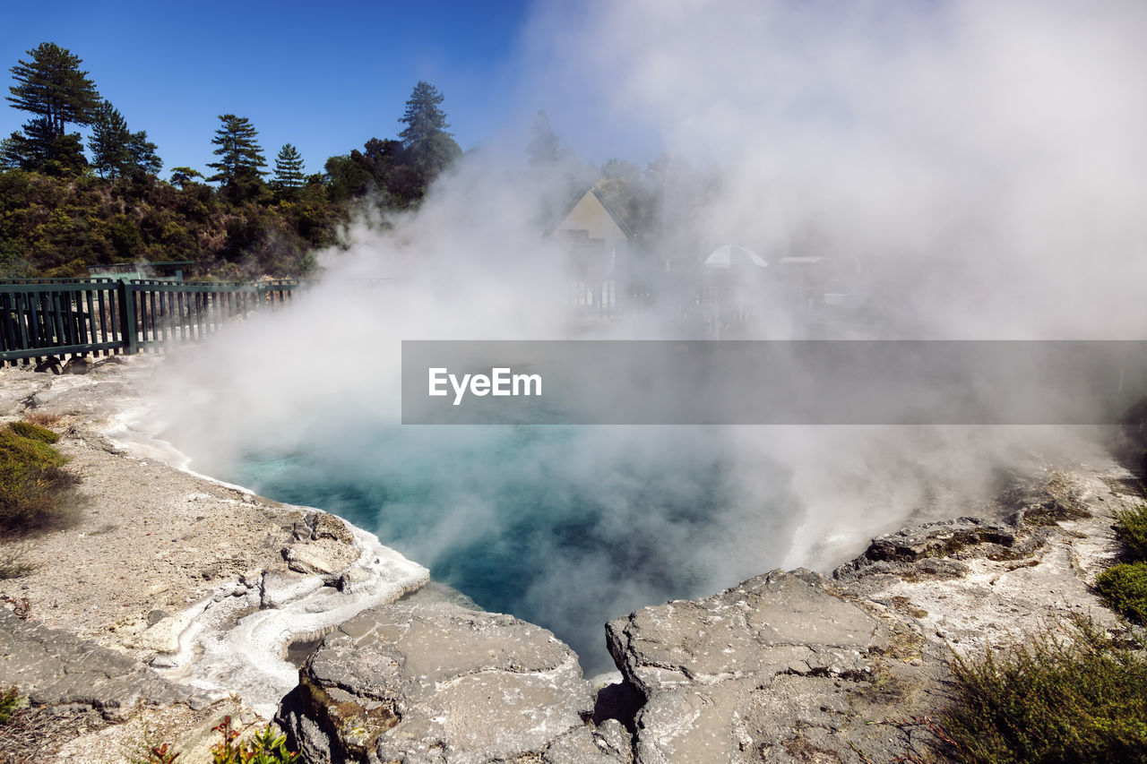 SCENIC VIEW OF SMOKE ON LAND