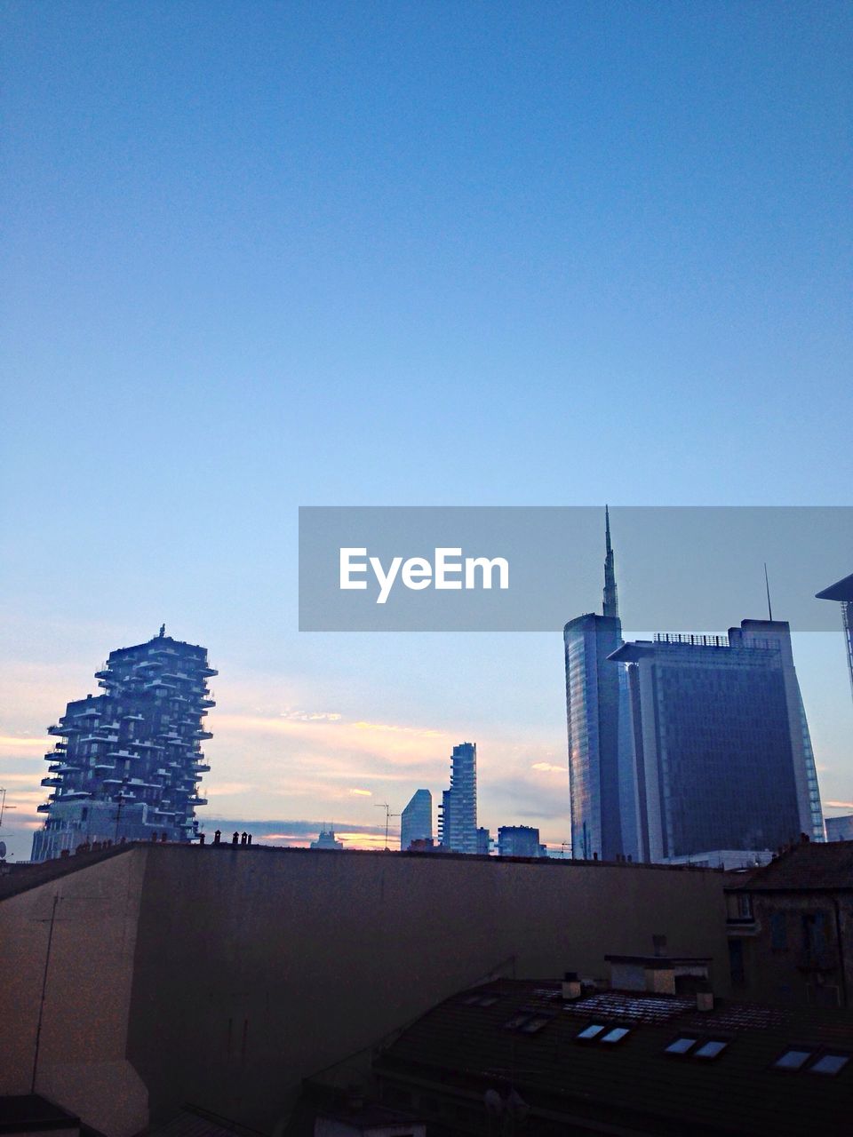 VIEW OF MODERN BUILDINGS AGAINST CLEAR SKY