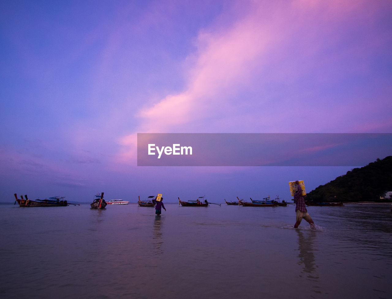 SCENIC VIEW OF SEA AT SUNSET