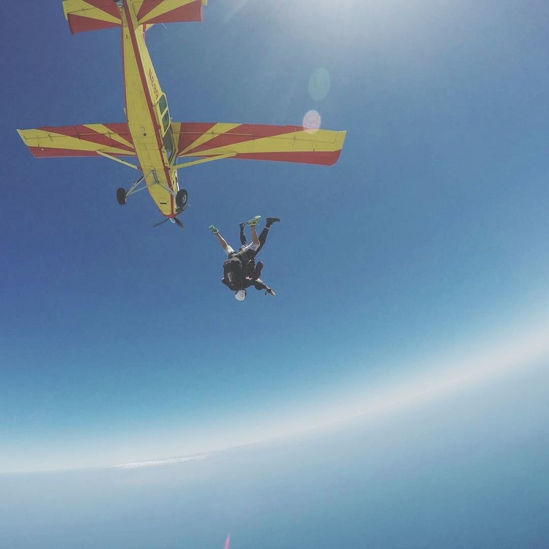 LOW ANGLE VIEW OF AIRSHOW AGAINST CLEAR SKY