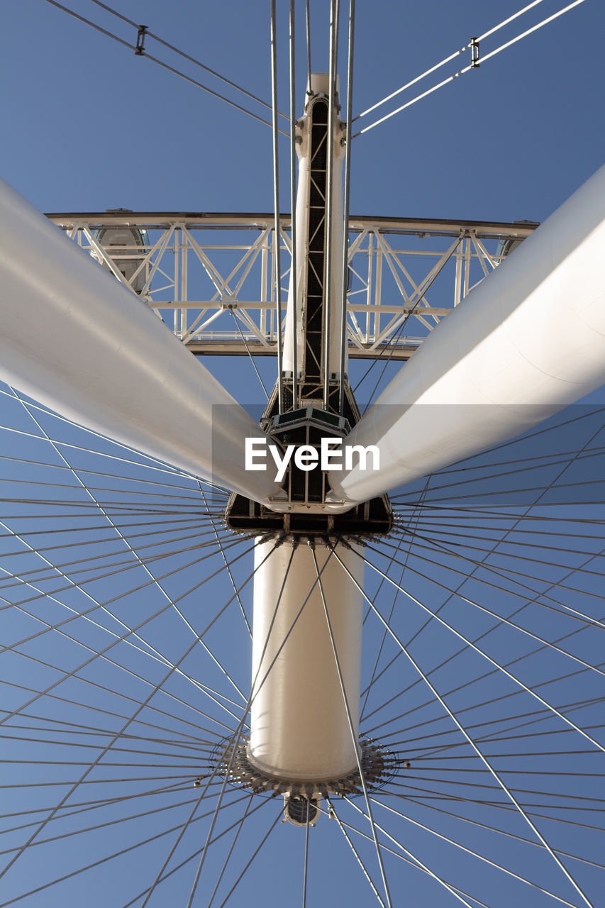 Low angle view of london eye against sky