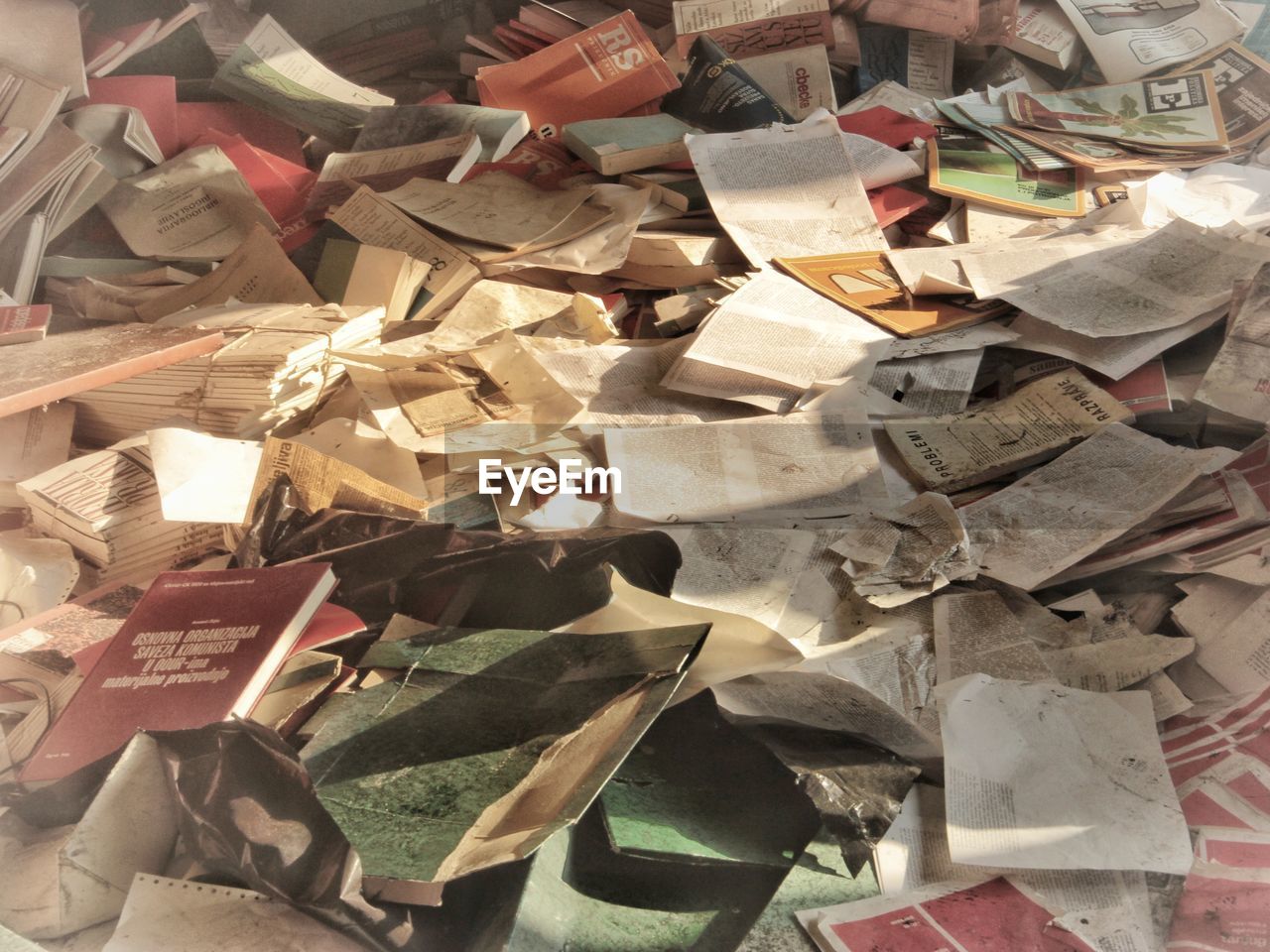 HIGH ANGLE VIEW OF PAPER FOR SALE AT MARKET