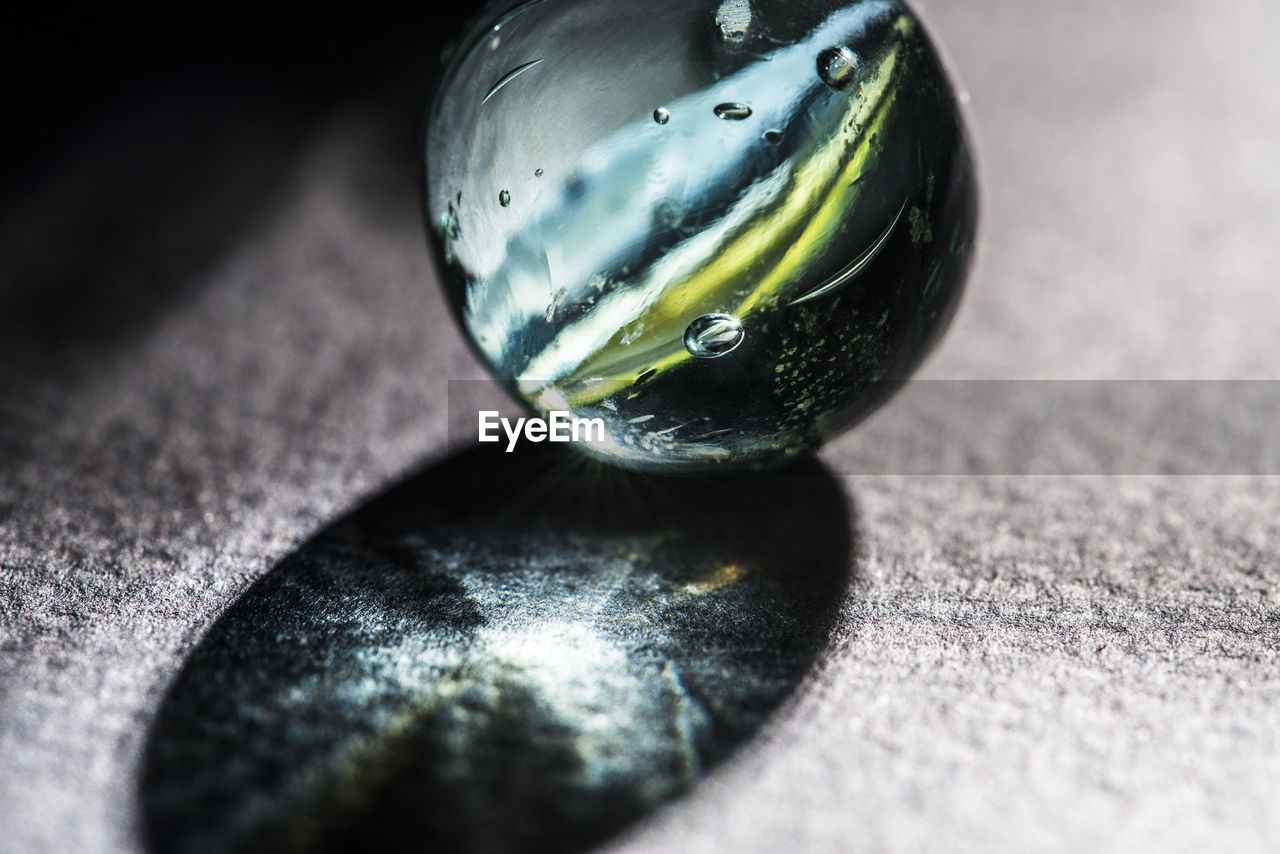 CLOSE UP OF BALL ON TABLE