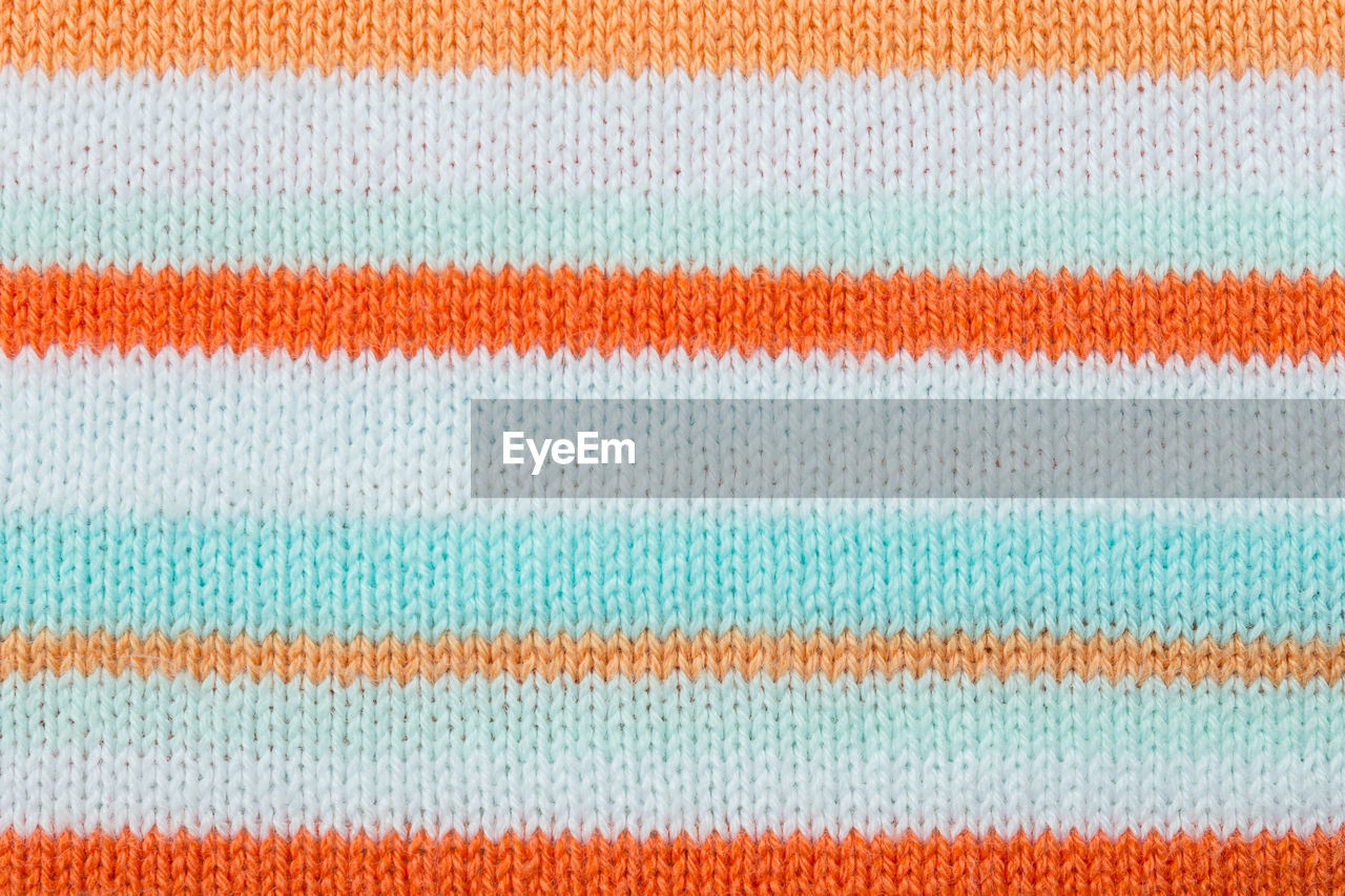Full frame shot of striped woolen textile