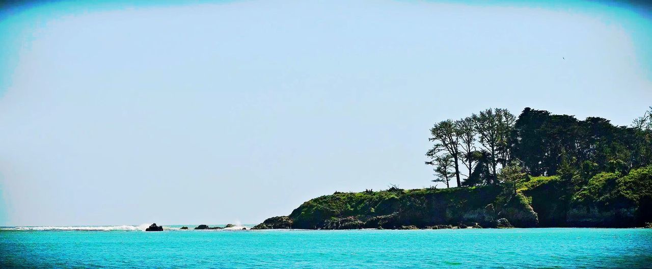 Scenic view of sea against clear sky