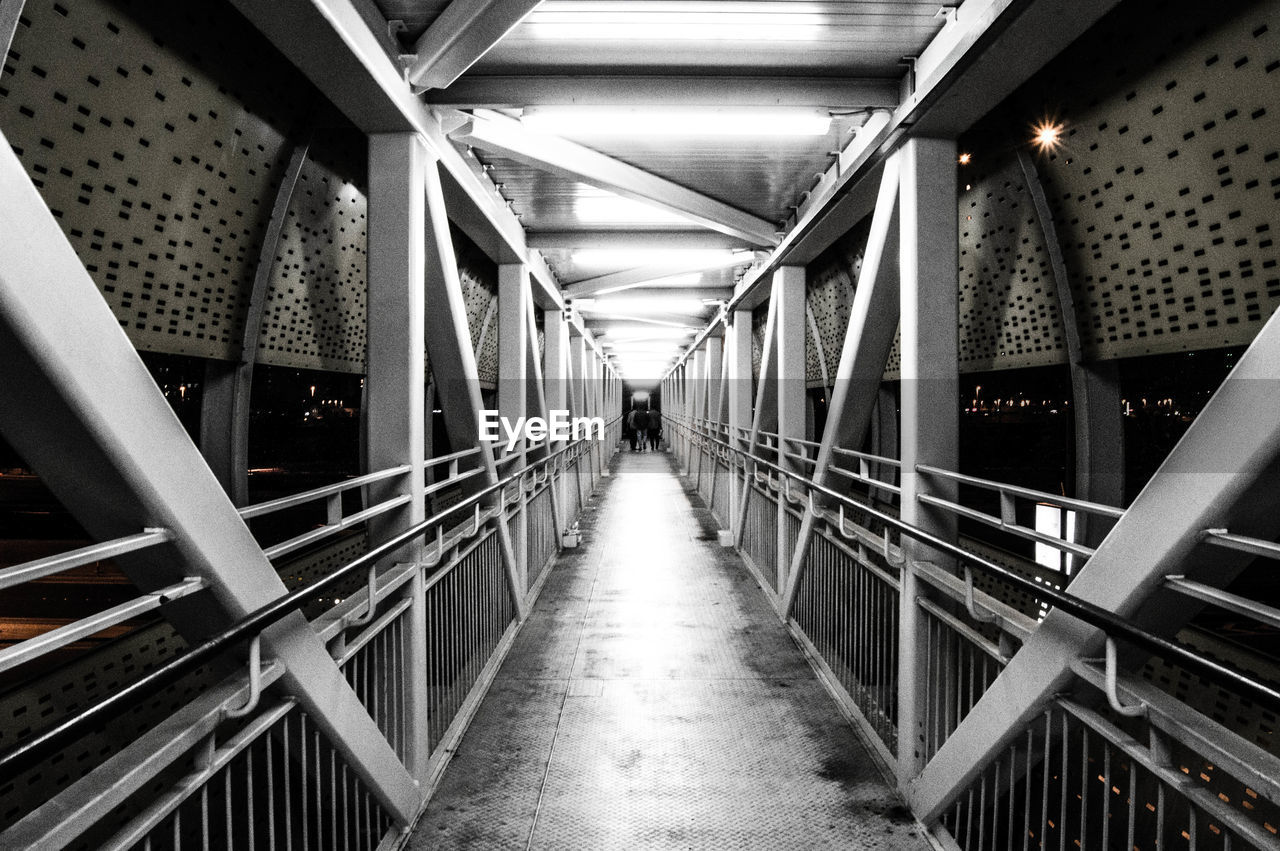 Narrow illuminated bridge