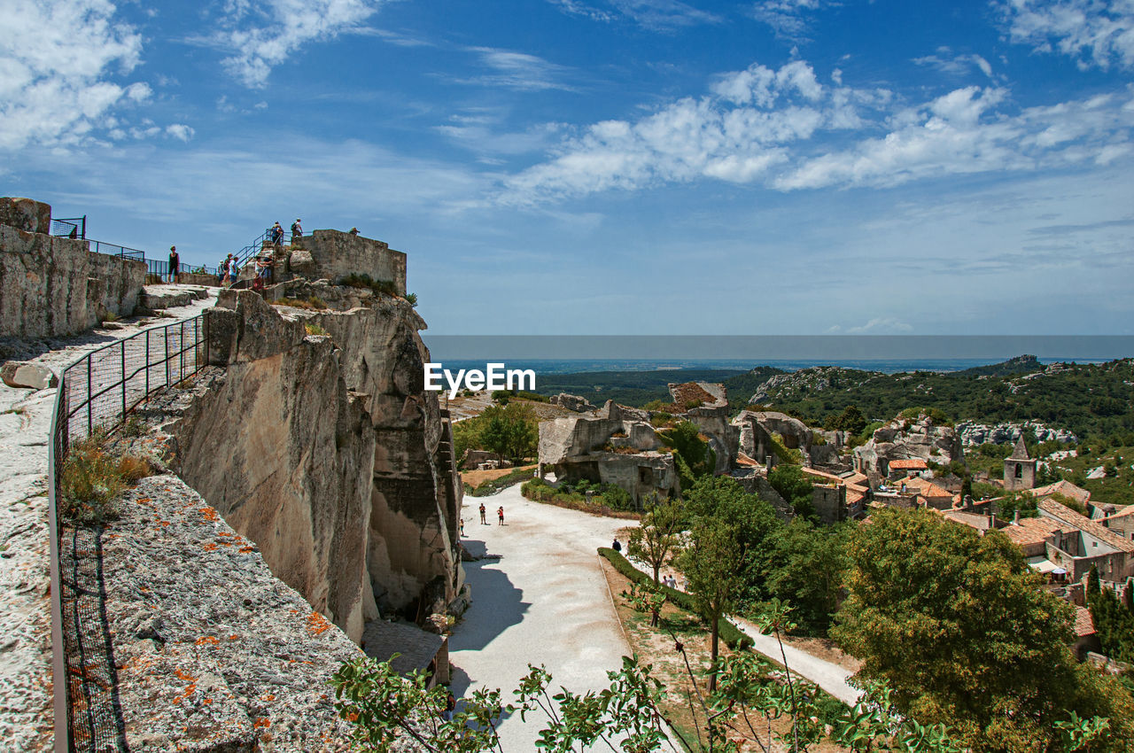 Castle of baux-de-provence at the top of the hill, with the roofs of the village just below, france.