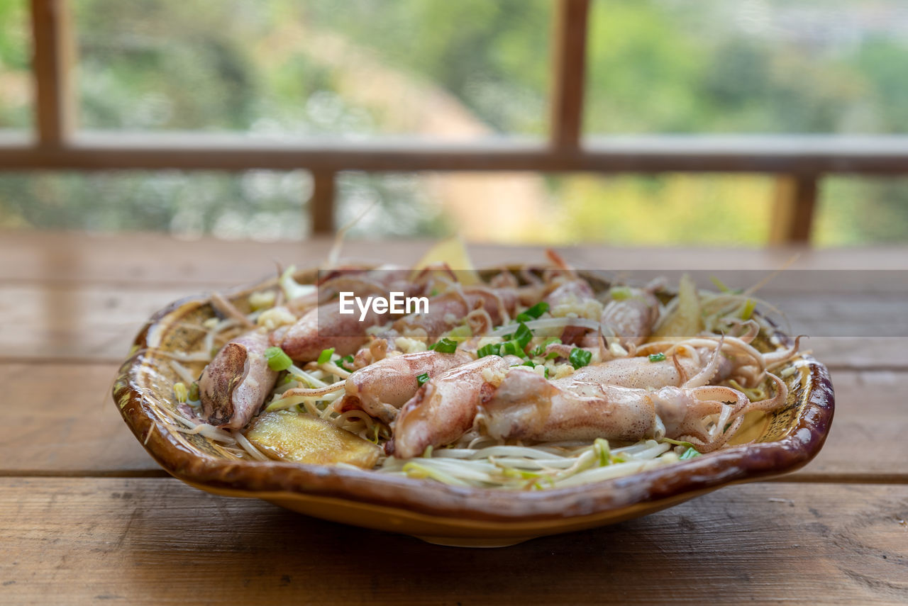 food, food and drink, healthy eating, freshness, dish, wellbeing, seafood, table, no people, vegetable, wood, indoors, focus on foreground, produce, meal, shrimp, cuisine, animal, day, meat, plate, selective focus, plant, close-up, crustacean